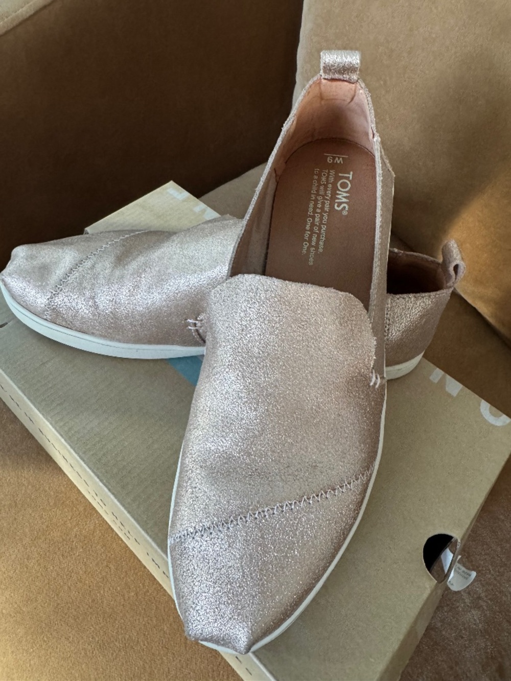 Toms Size 9 Rose gold slip ons